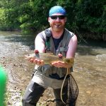 Brown trout caught in stream image