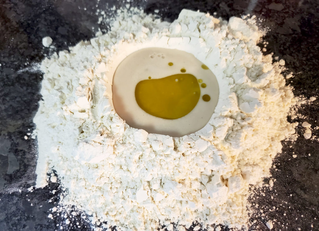 make a flour volcano on your counter